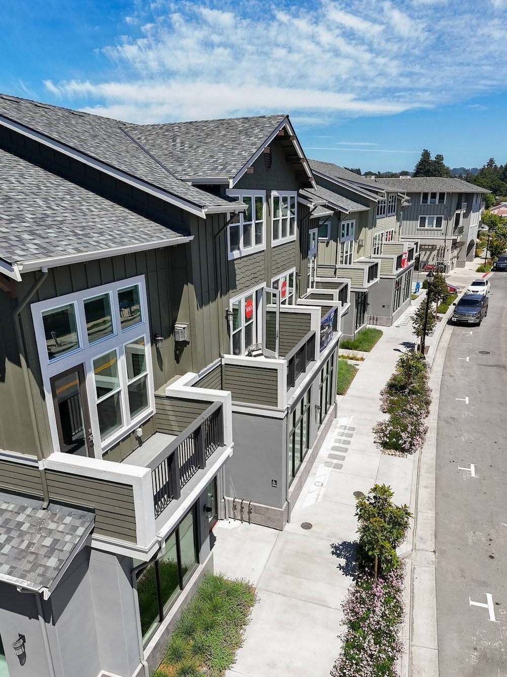 Multi-family residential community featuring professionally installed and maintained landscaping by K&D Landscaping