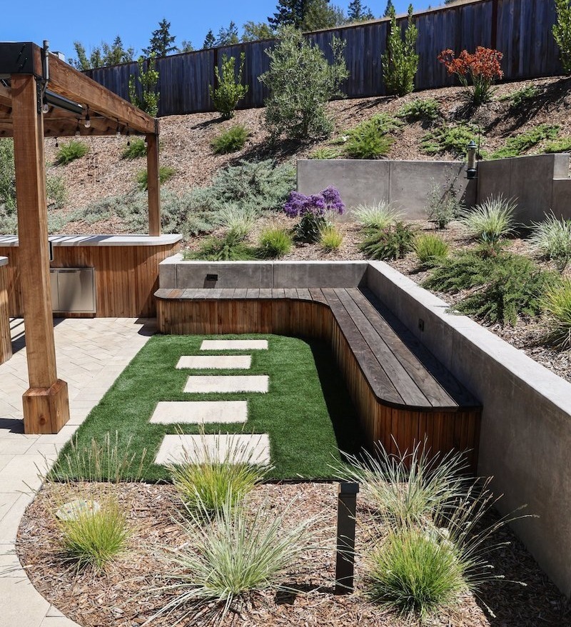 Artificial lawn connected to planting beds and edible garden areas by K&D Landscaping Artificial lawn connected to planting beds and edible garden areas by K&D Landscaping