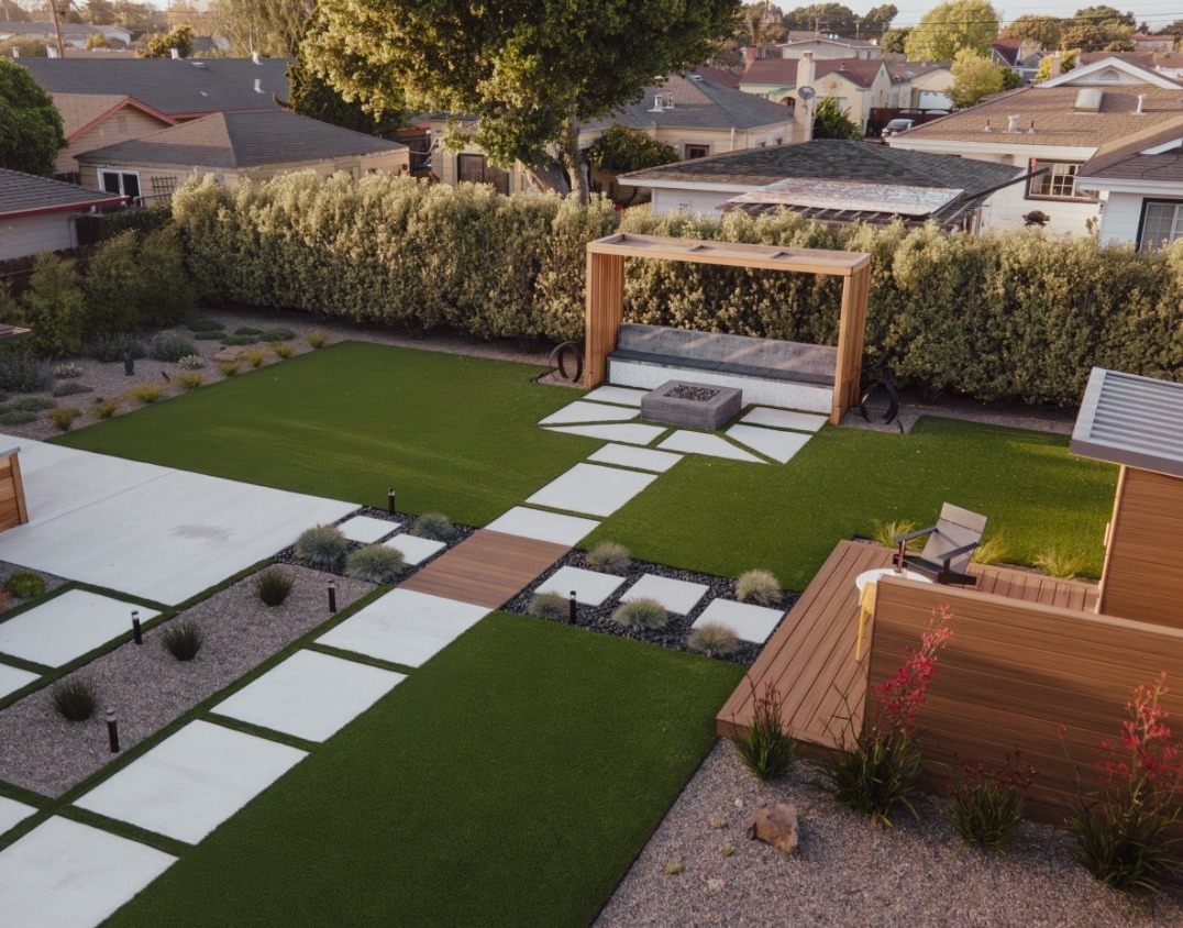 Backyard transformation balancing hardscape planting and wellness features by K&D Landscaping