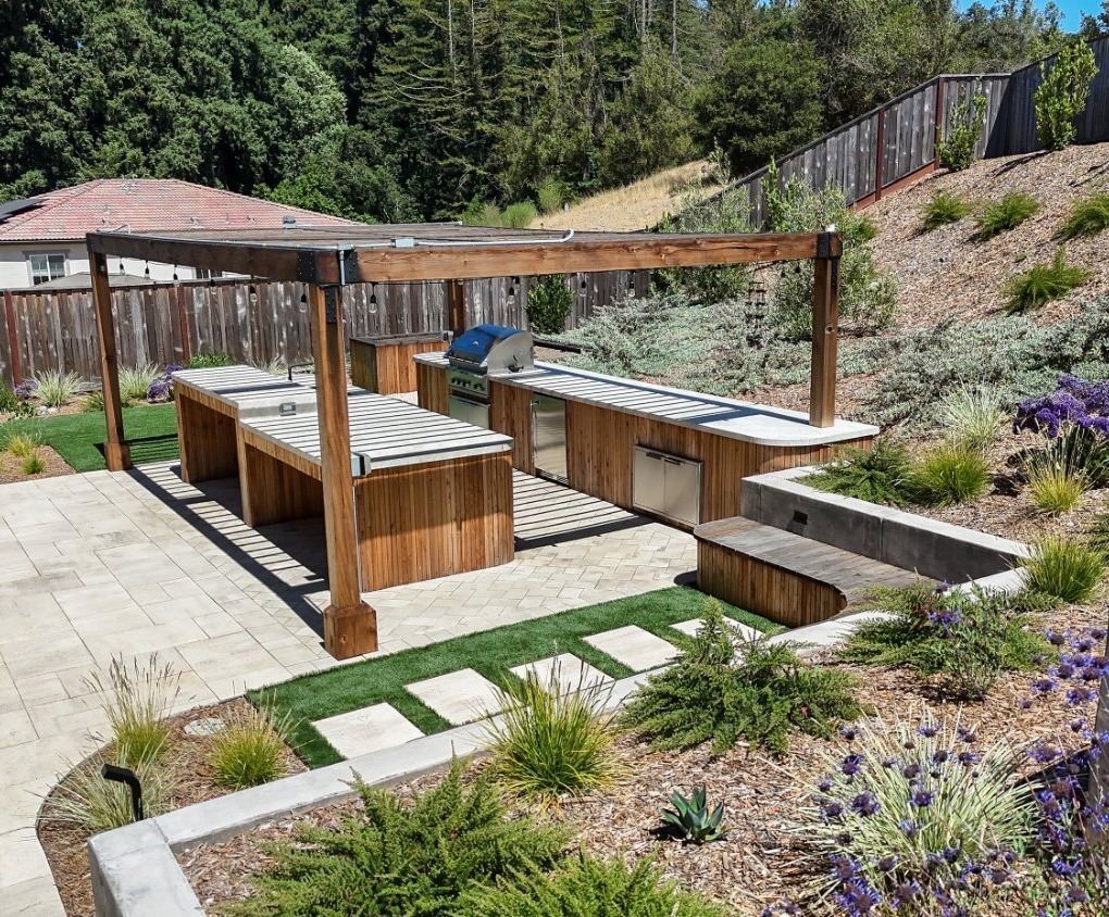 Citrus trees and edible garden incorporated into a residential landscape by K&D Landscaping