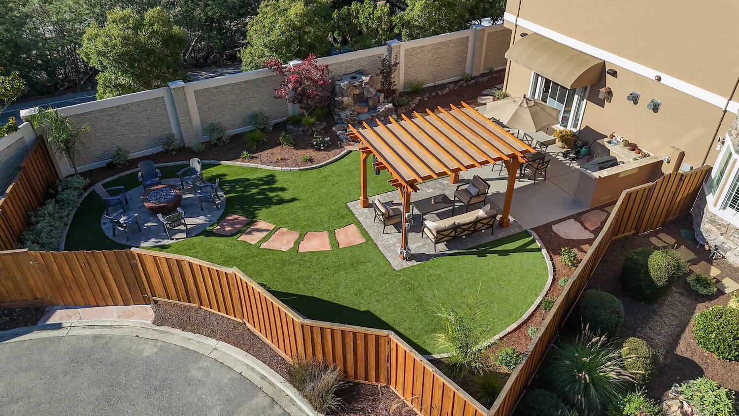 Residential garden pathway and natural planting design by K&D Landscaping