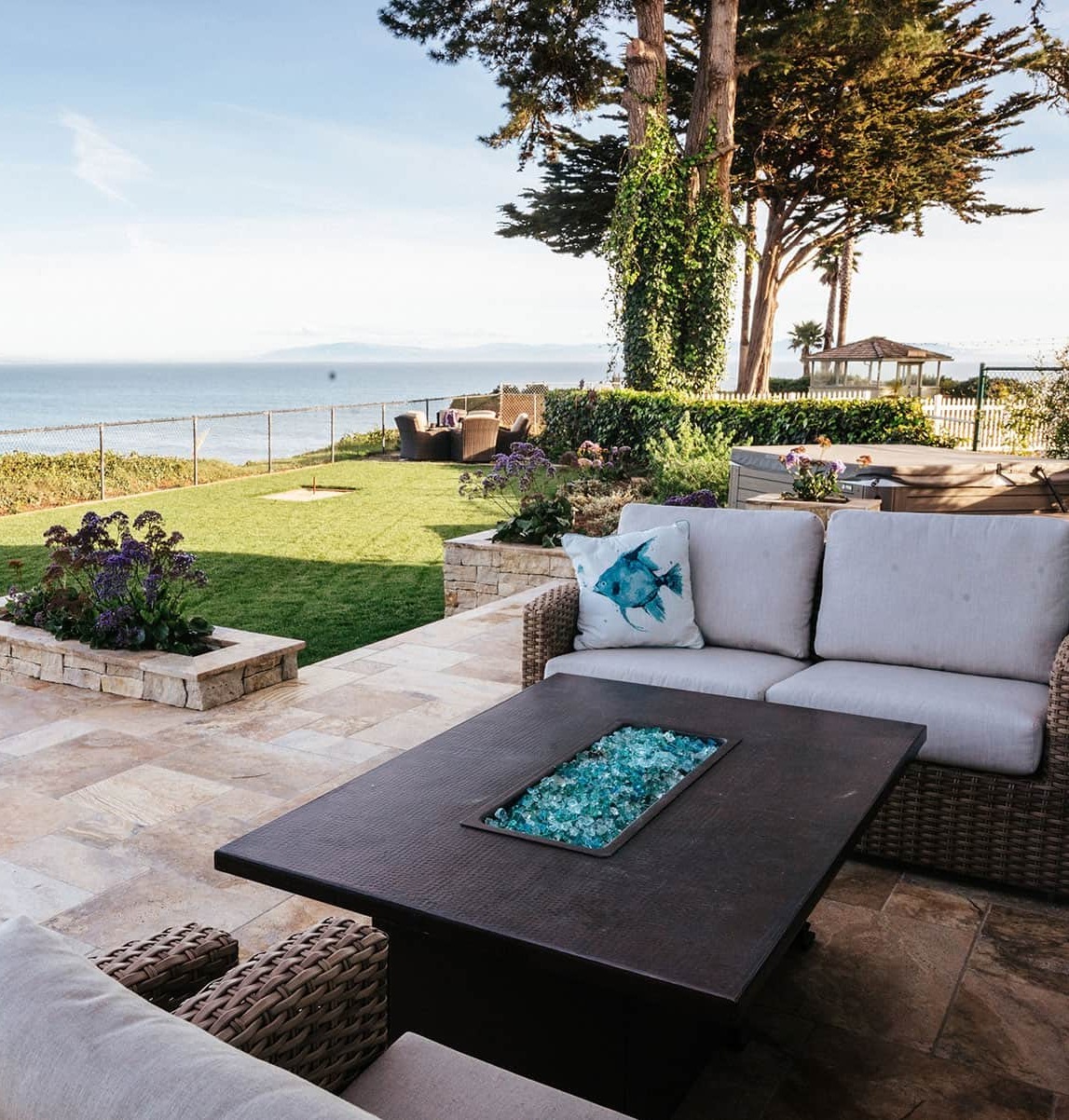 Custom residential landscape featuring integrated hardscape and plantings by K&D Landscaping Custom residential landscape featuring integrated hardscape and plantings by K&D Landscaping