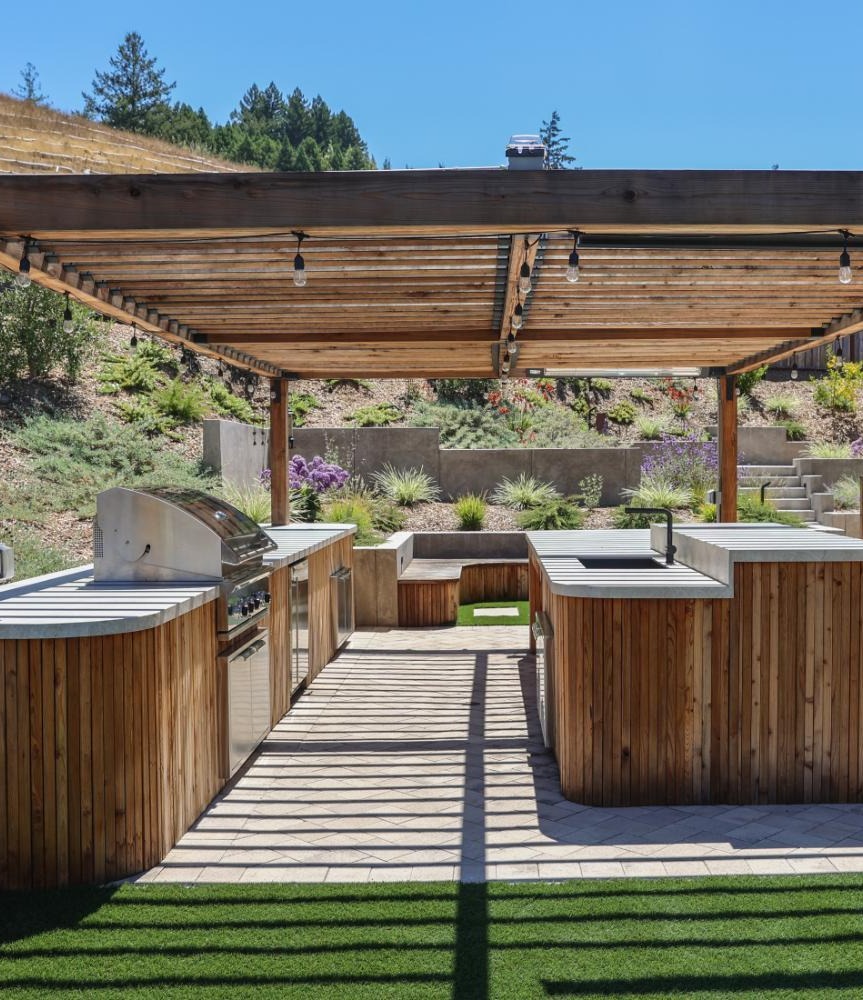 Backyard landscape renovation featuring custom outdoor spaces by K&D Landscaping
