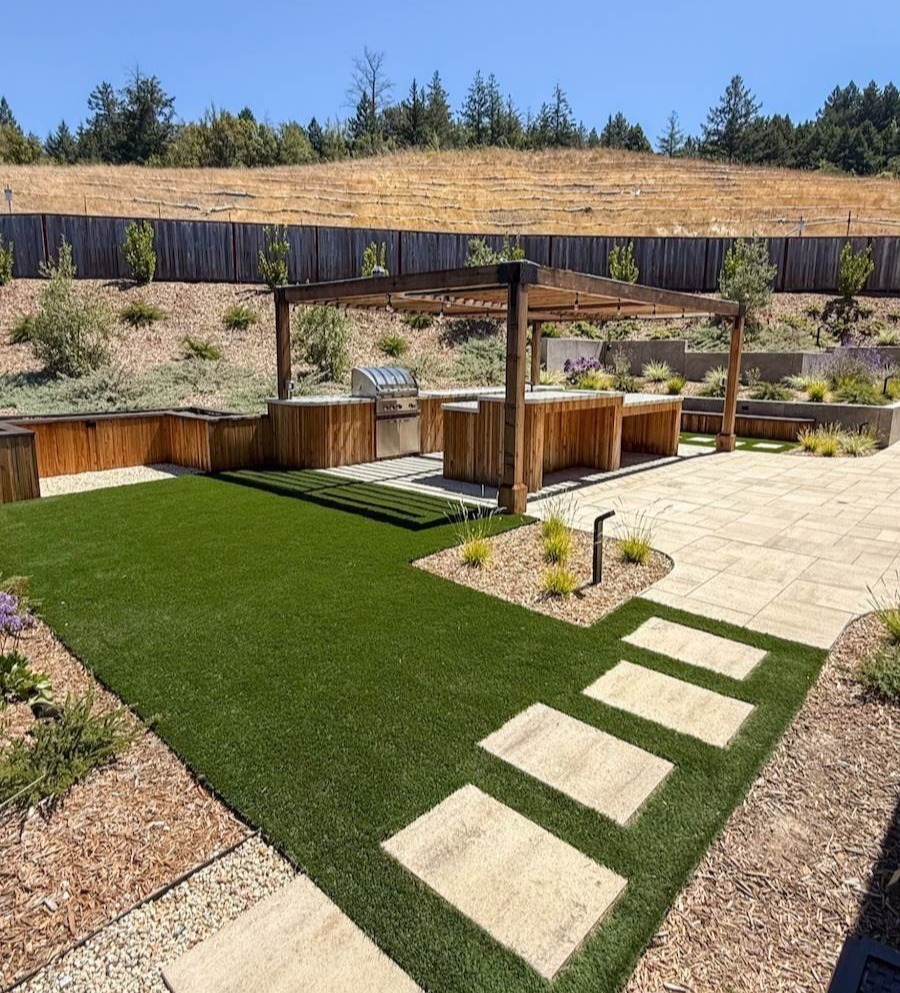 Professionally installed landscape improvements for a residential property by K&D Landscaping