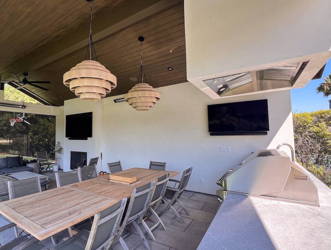 Pavilion and outdoor kitchen by K&D Landscaping