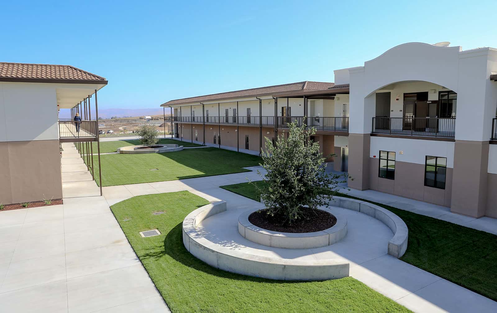 School grounds featuring hydroseeded turf and custom landscape design by K&D Landscaping