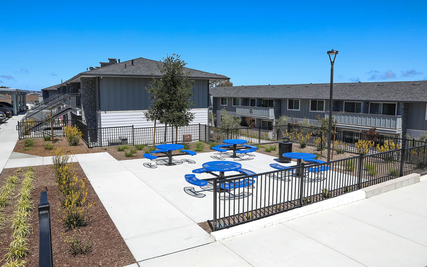 Apartment community grounds enhanced with professional landscape services by K&D Landscaping