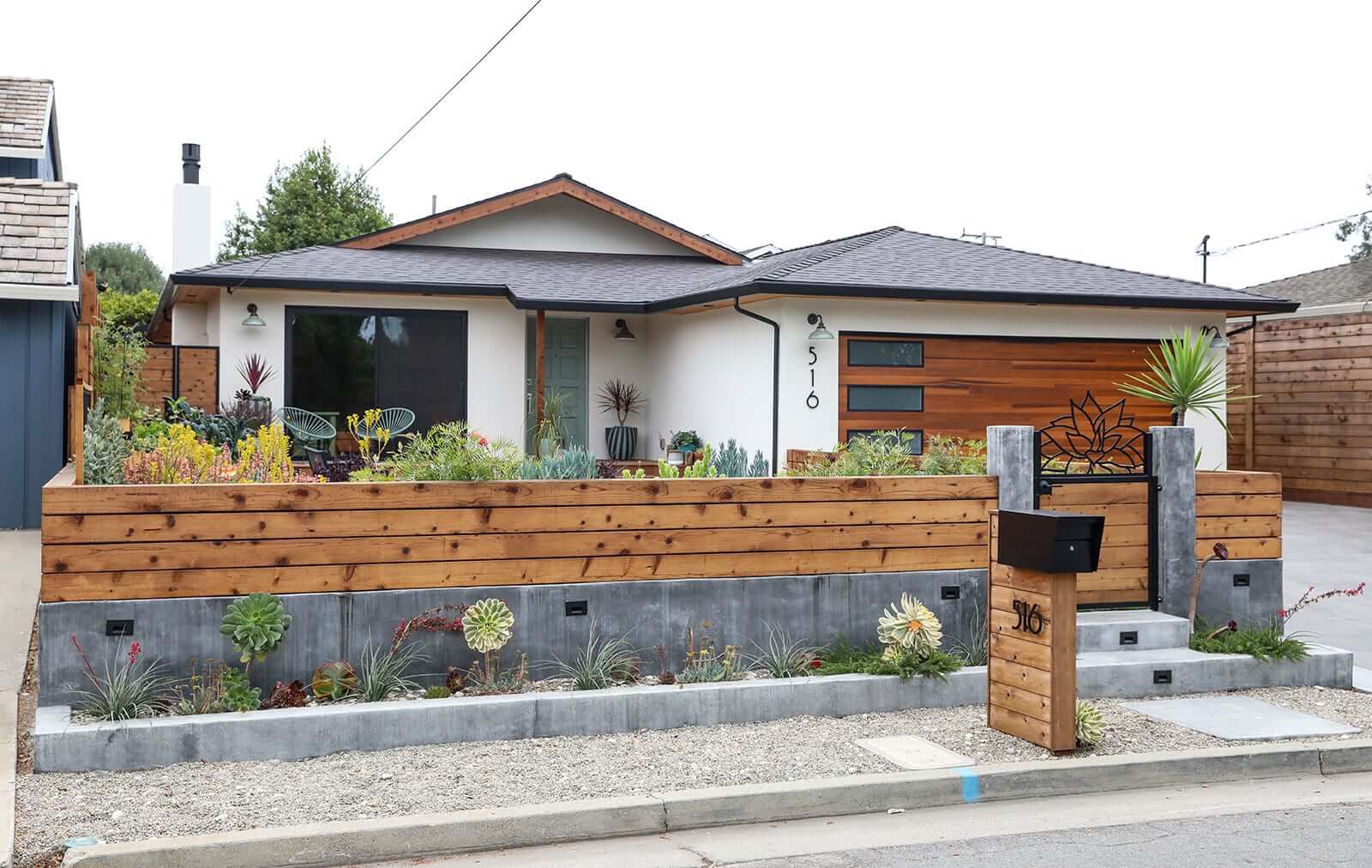 Artificial turf lawn integrated into a sustainable residential landscape by K&D Landscaping