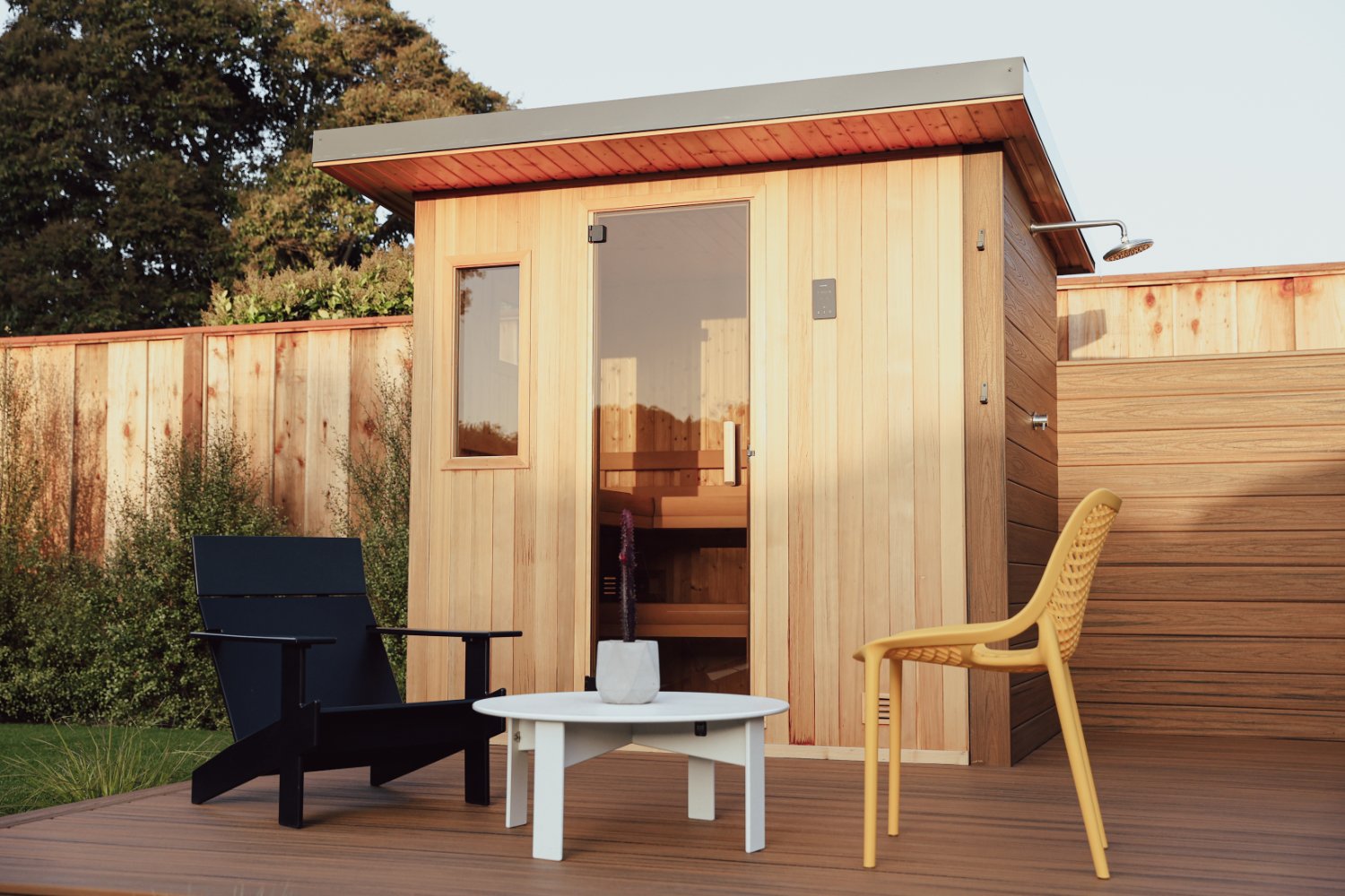 Backyard retreat featuring lawn decking and wellness-focused amenities by K&D Landscaping
