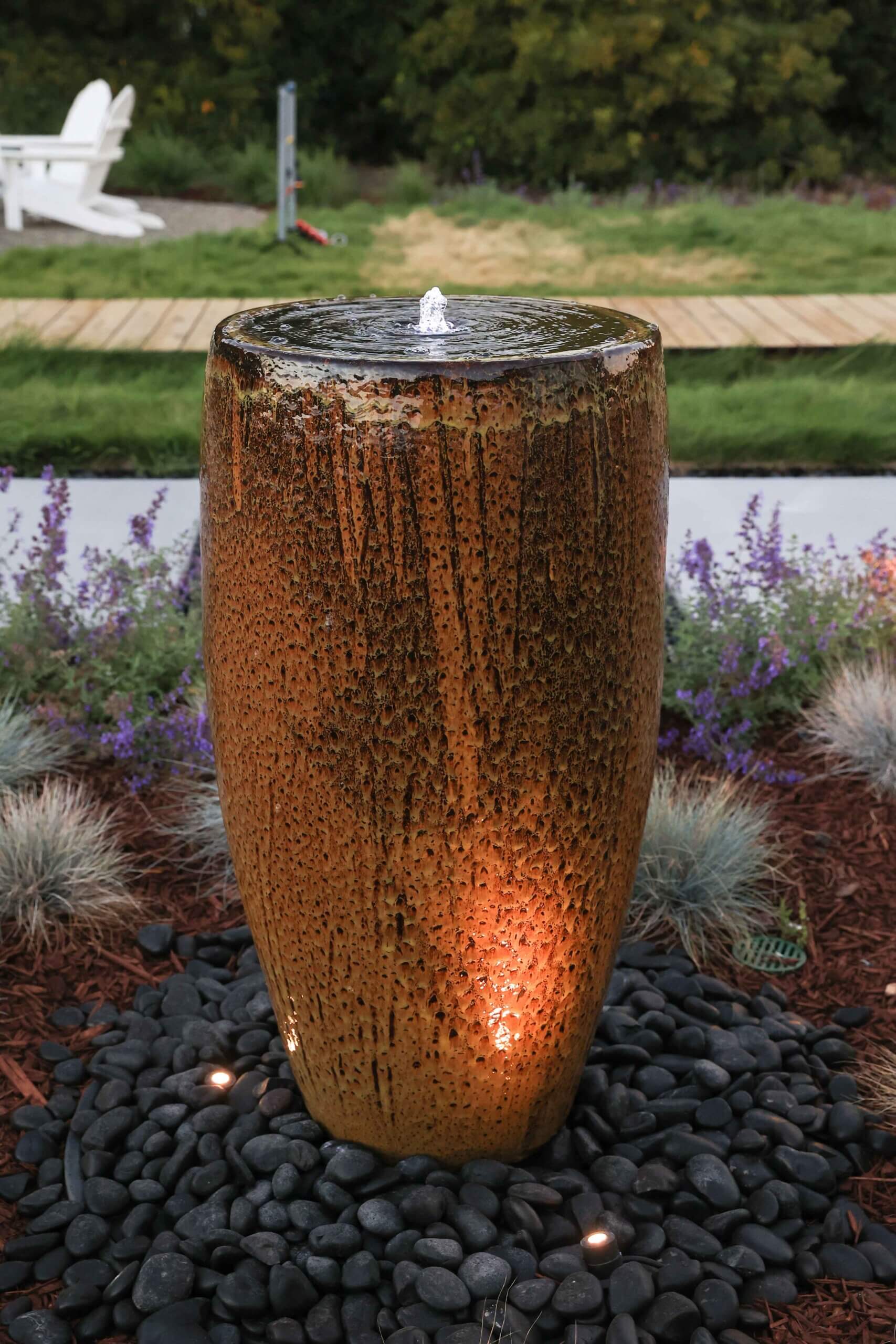 Comfortable outdoor retreat designed around residential landscape goals by K&D Landscaping