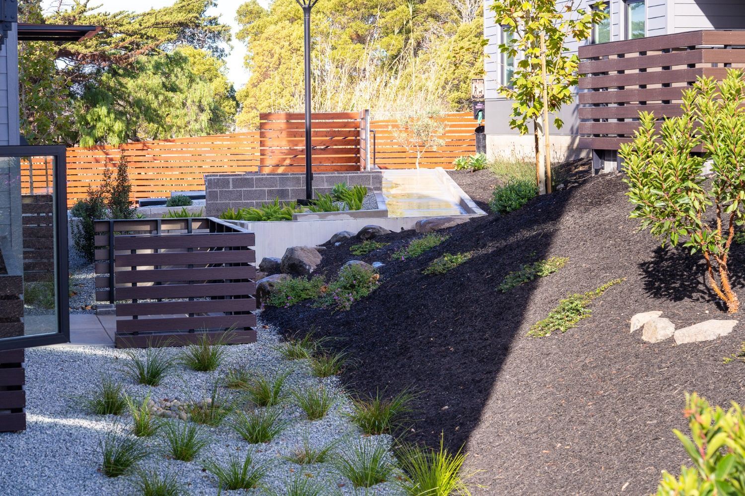 Commercial landscape installation surrounding apartment buildings by K&D Landscaping