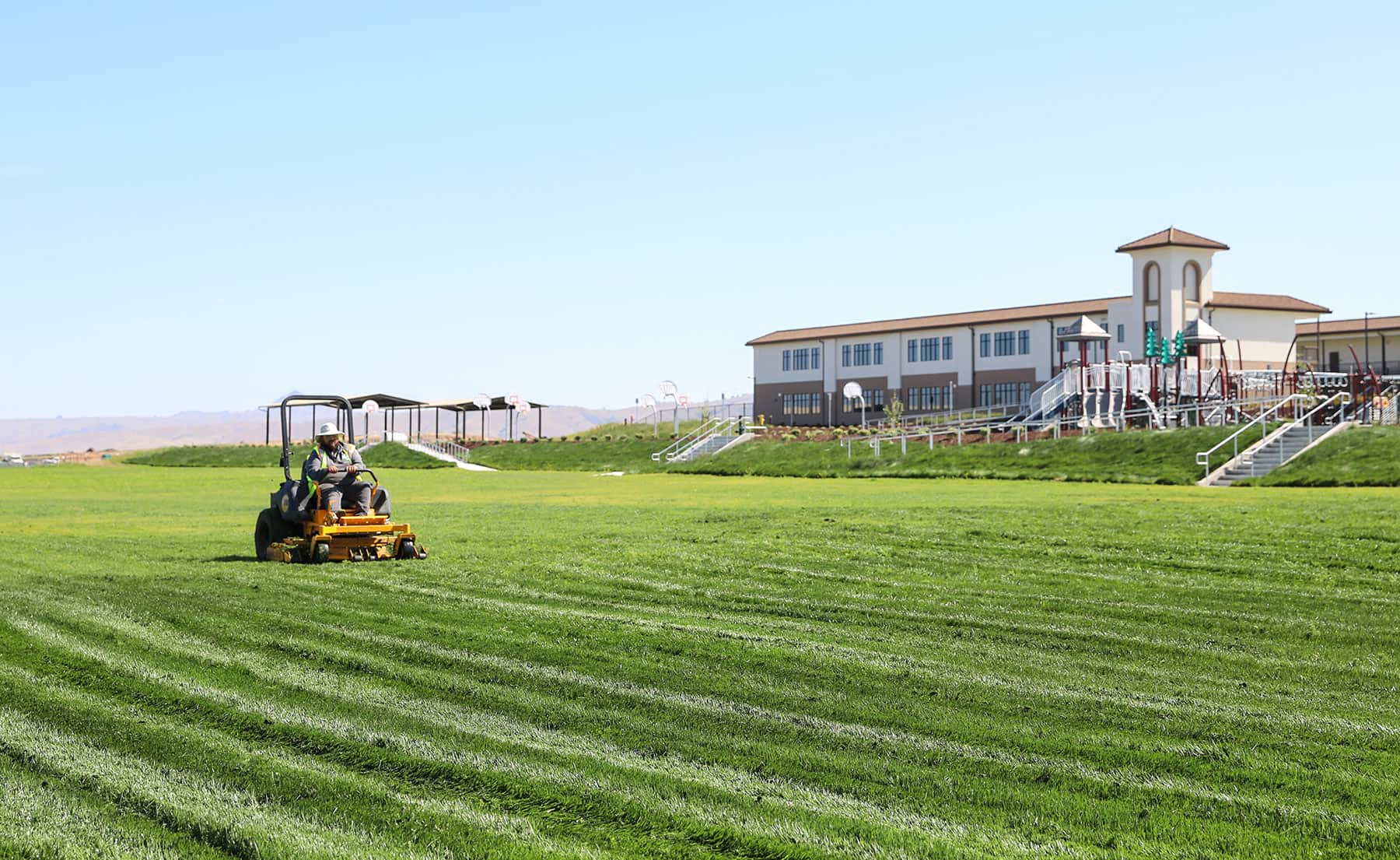 Educational facility grounds enhanced with professional landscaping by K&D Landscaping