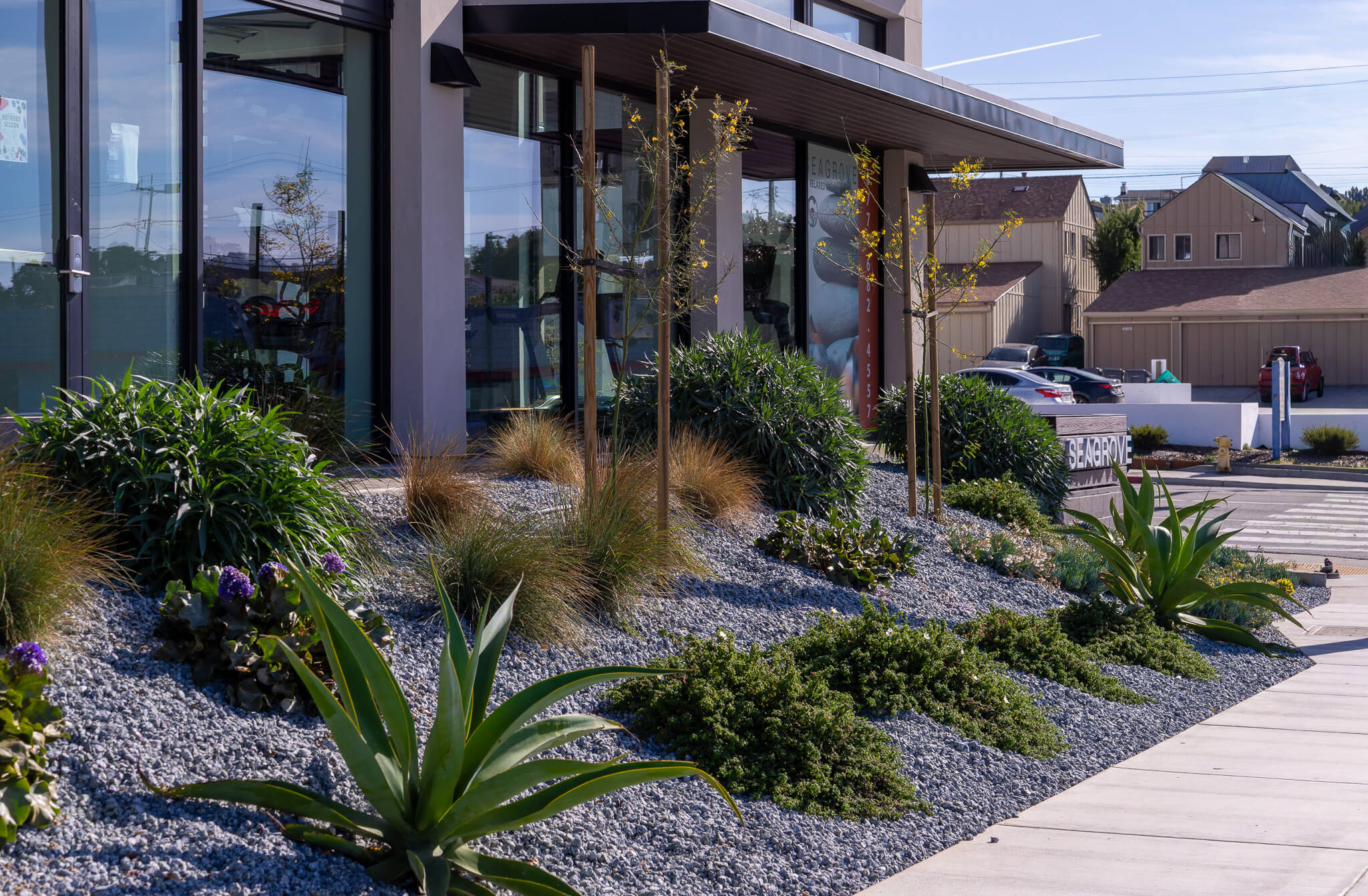 Commercial community landscape construction featuring recreational amenities, artificial turf, and outdoor gathering spaces by K&D Landscaping