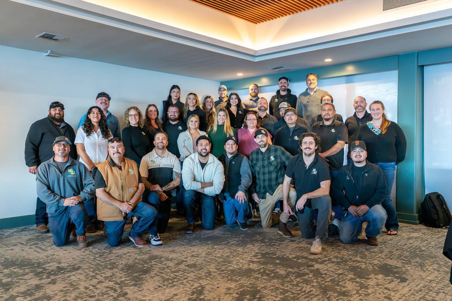 K&D Landscaping employees in an office setting
