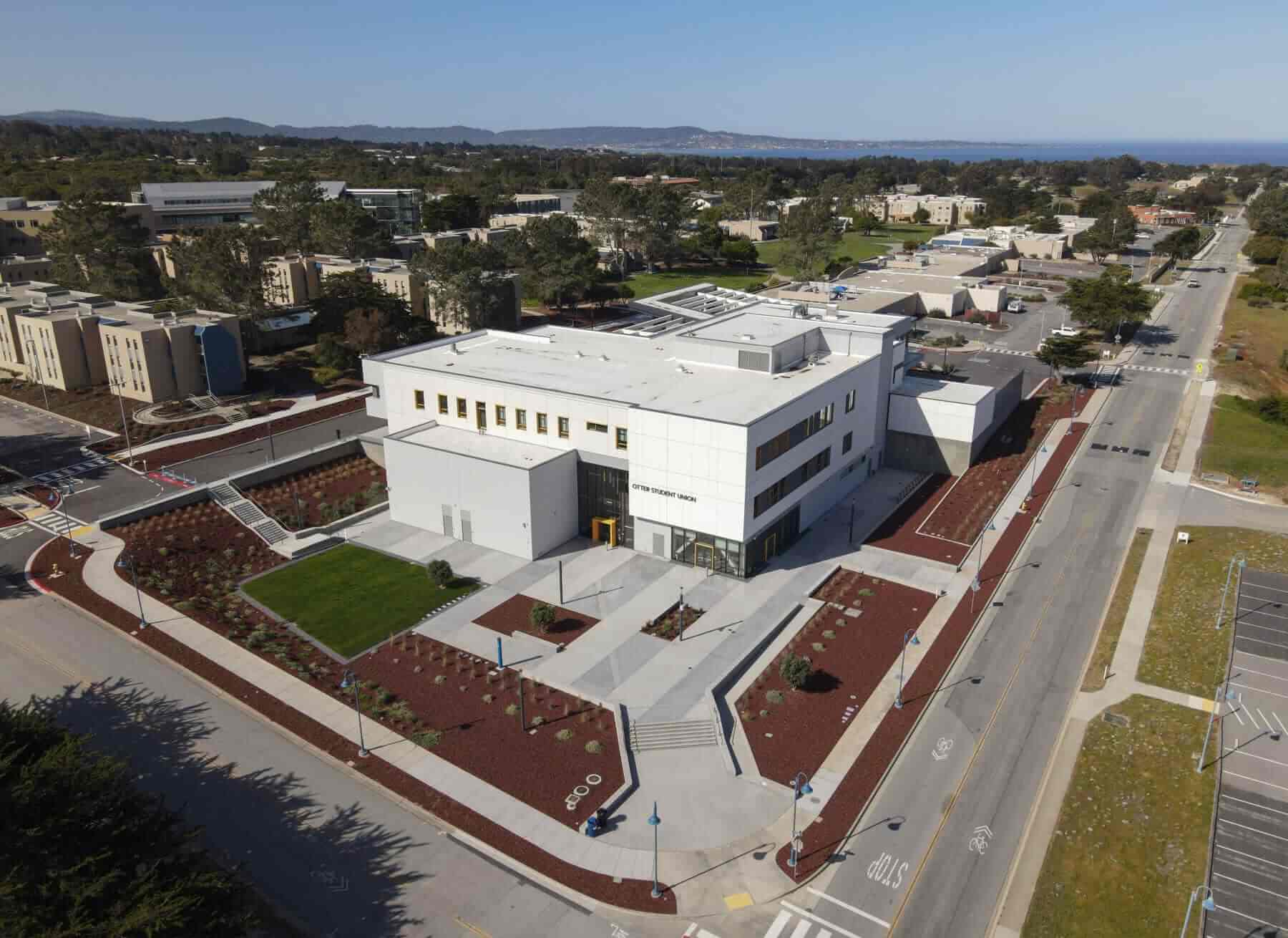 Modern educational facility surrounded by professionally maintained landscaping by K&D Landscaping