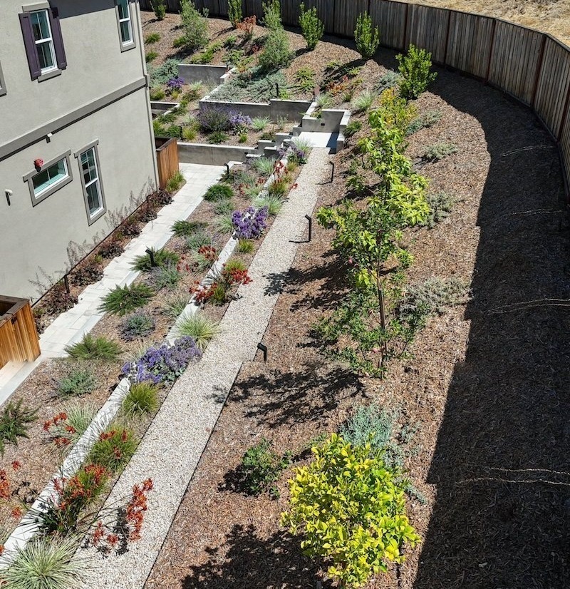 Multi-level backyard designed for entertaining and everyday use by K&D Landscaping