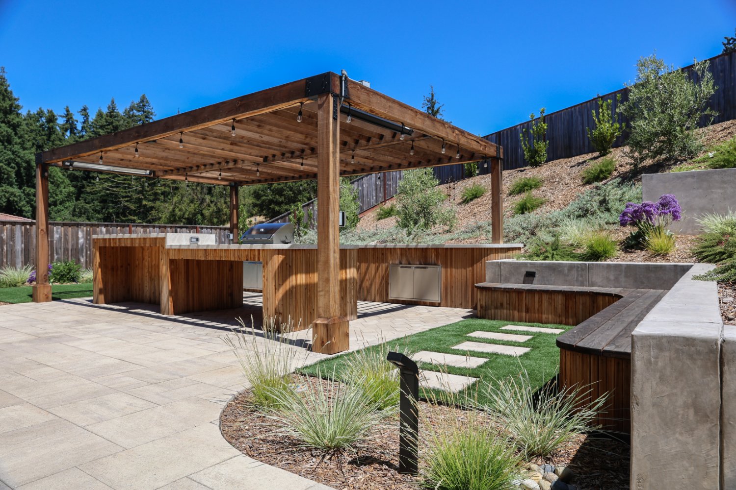 Multi-level residential landscape designed around significant elevation changes by K&D Landscaping