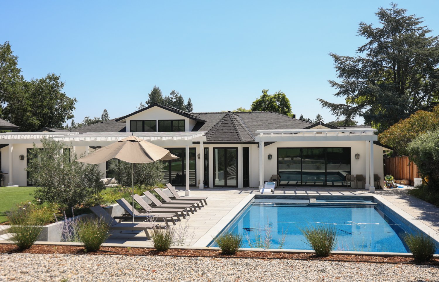 Outdoor retreat with luxury amenities designed for entertaining and relaxation by K&D Landscaping