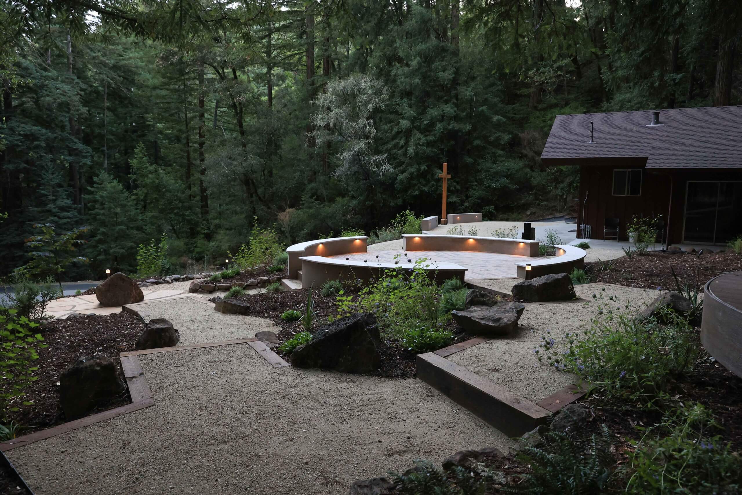 Peaceful outdoor retreat featuring custom hardscape, planting, and water features by K&D Landscaping