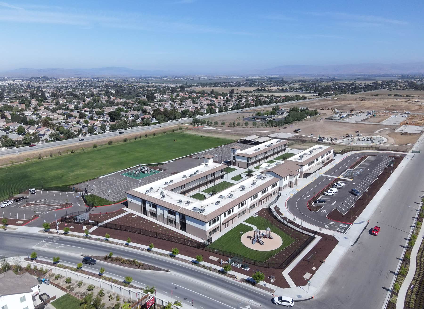 Commercial landscape construction project featuring planting and irrigation improvements by K&D Landscaping
