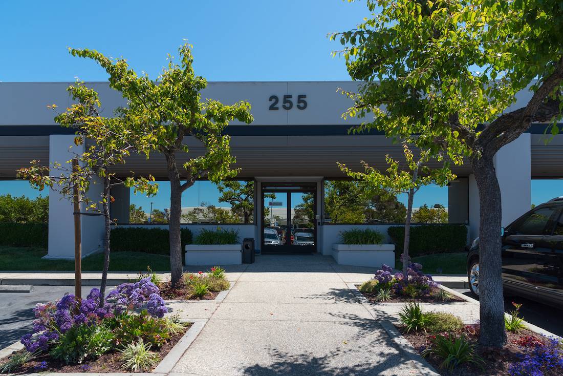 Commercial landscape installation featuring irrigation and planting improvements by K&D Landscaping