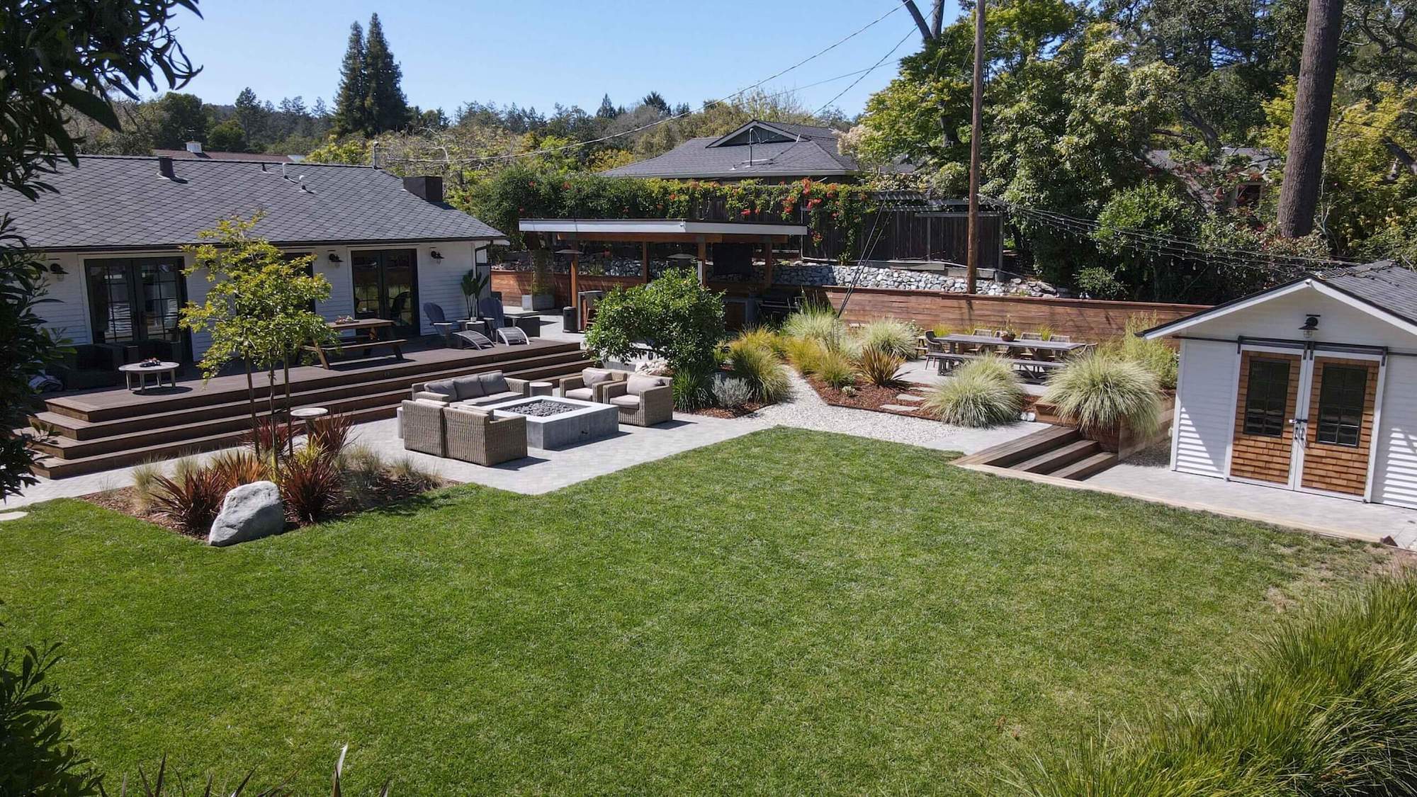 Residential landscape design-build project featuring outdoor entertaining spaces by K&D Landscaping