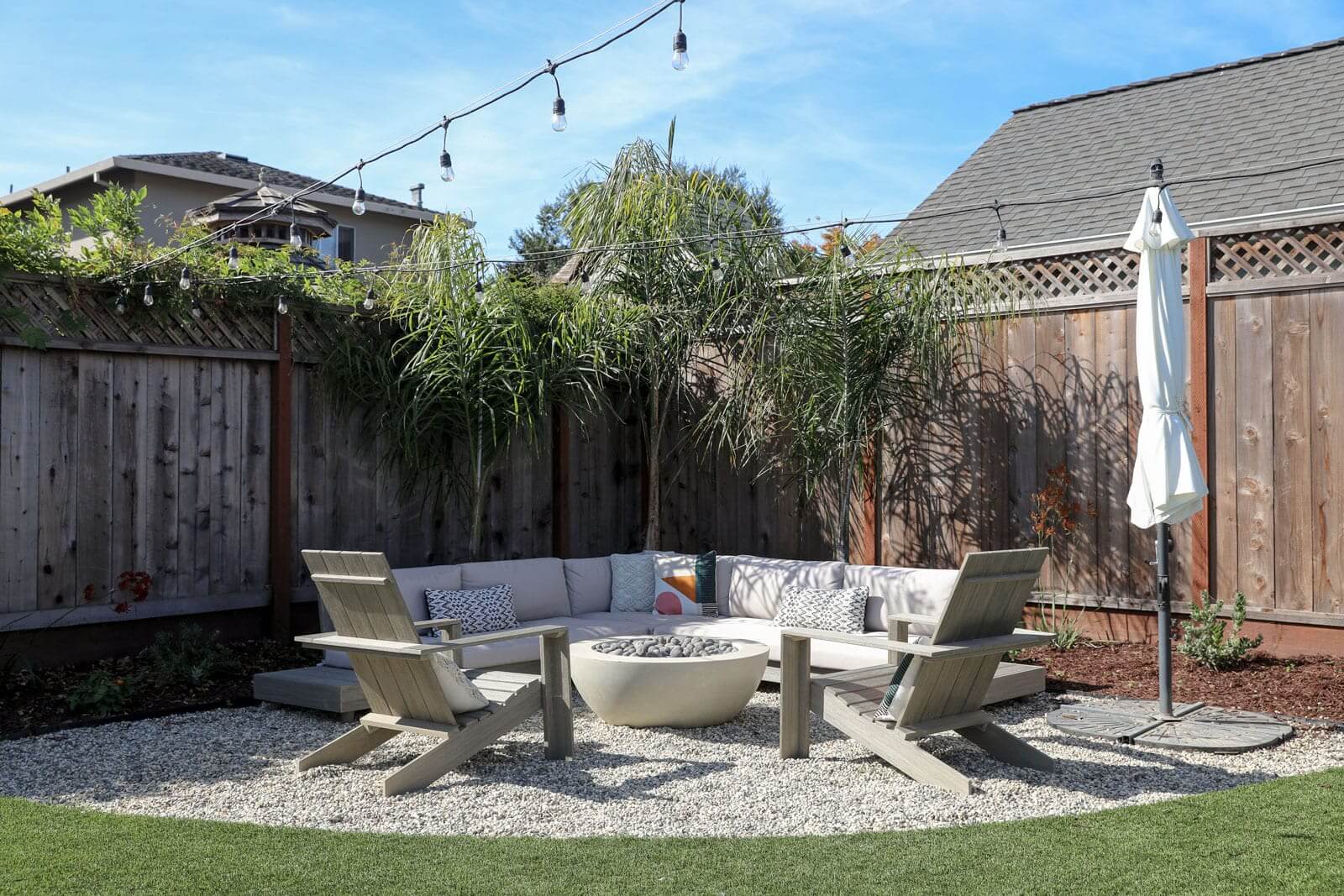 Residential outdoor retreat featuring custom hardscape and landscape improvements by K&D Landscaping