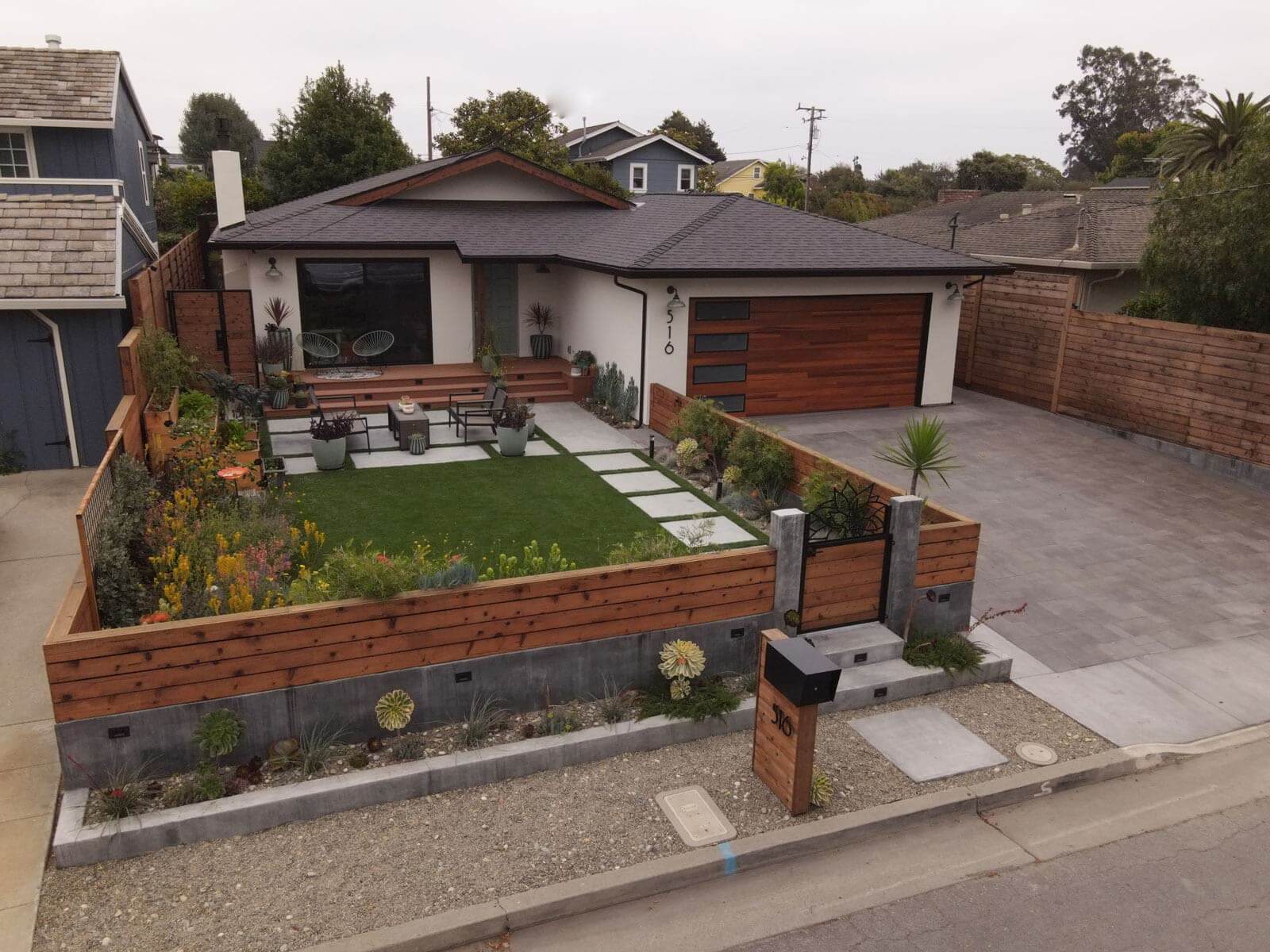 TimberTech stairs connecting multiple outdoor living levels by K&D Landscaping