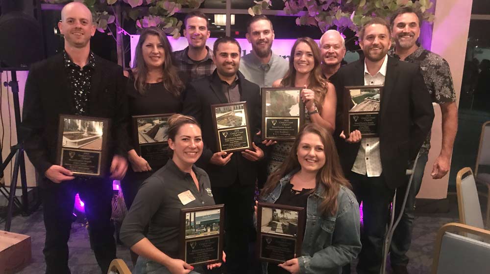 K&D Landscaping team with community awards