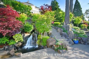 High-end home with waterfall pond and immaculate landscaping